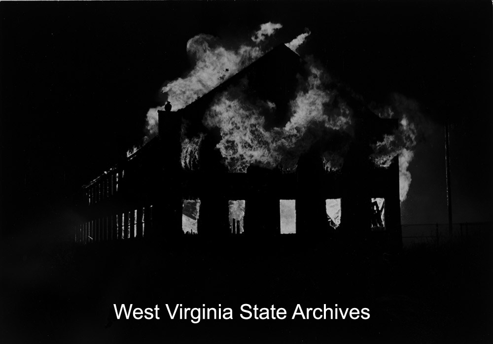 Martinsburg Warehouse and Commercial Center building fire, Martinsburg, November 30, 1989. For a decade, 1912-1922, the building was the plant for the Norwalk Motor Car Company. Jeff Hollis Collection, West Virginia State Archives (301202)