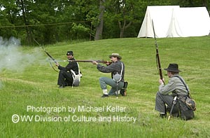 A skirmish line firing weapons